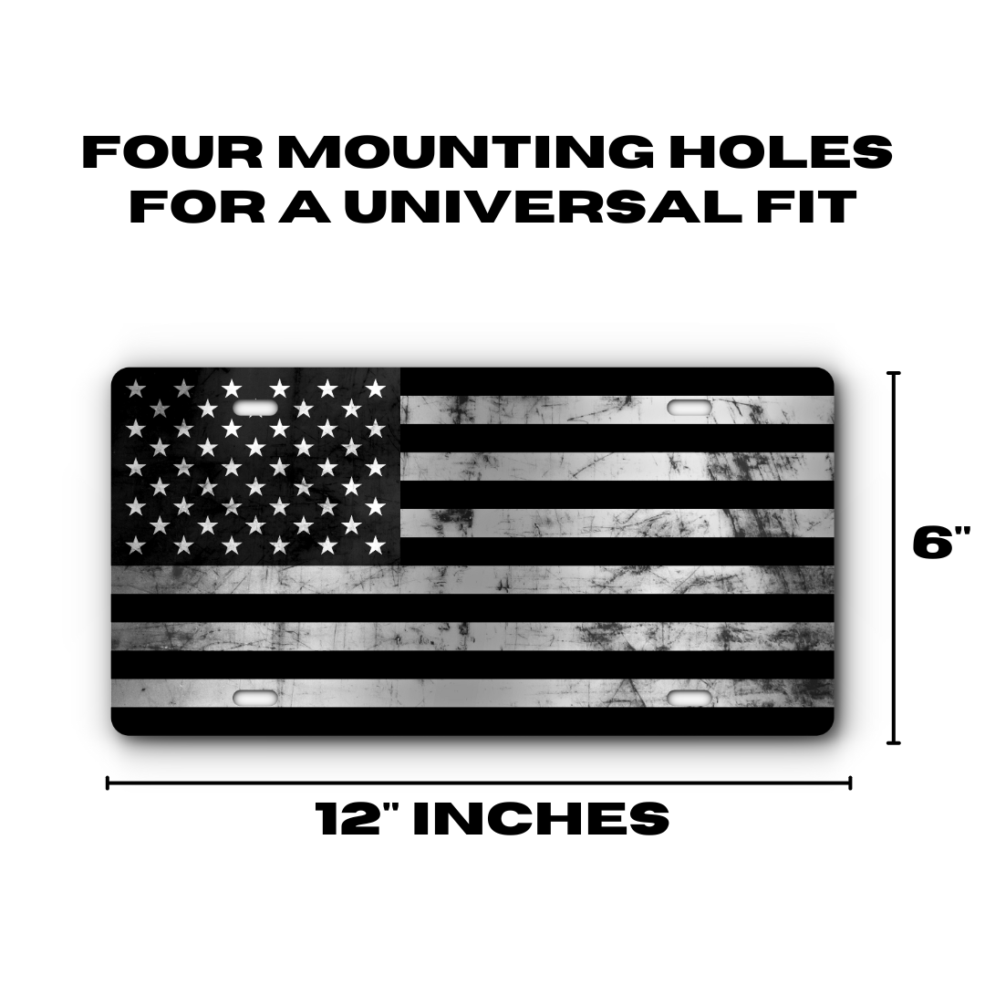Distressed American Flag – Black & Stainless plate size: 12 x 6 inches with four mounting holes