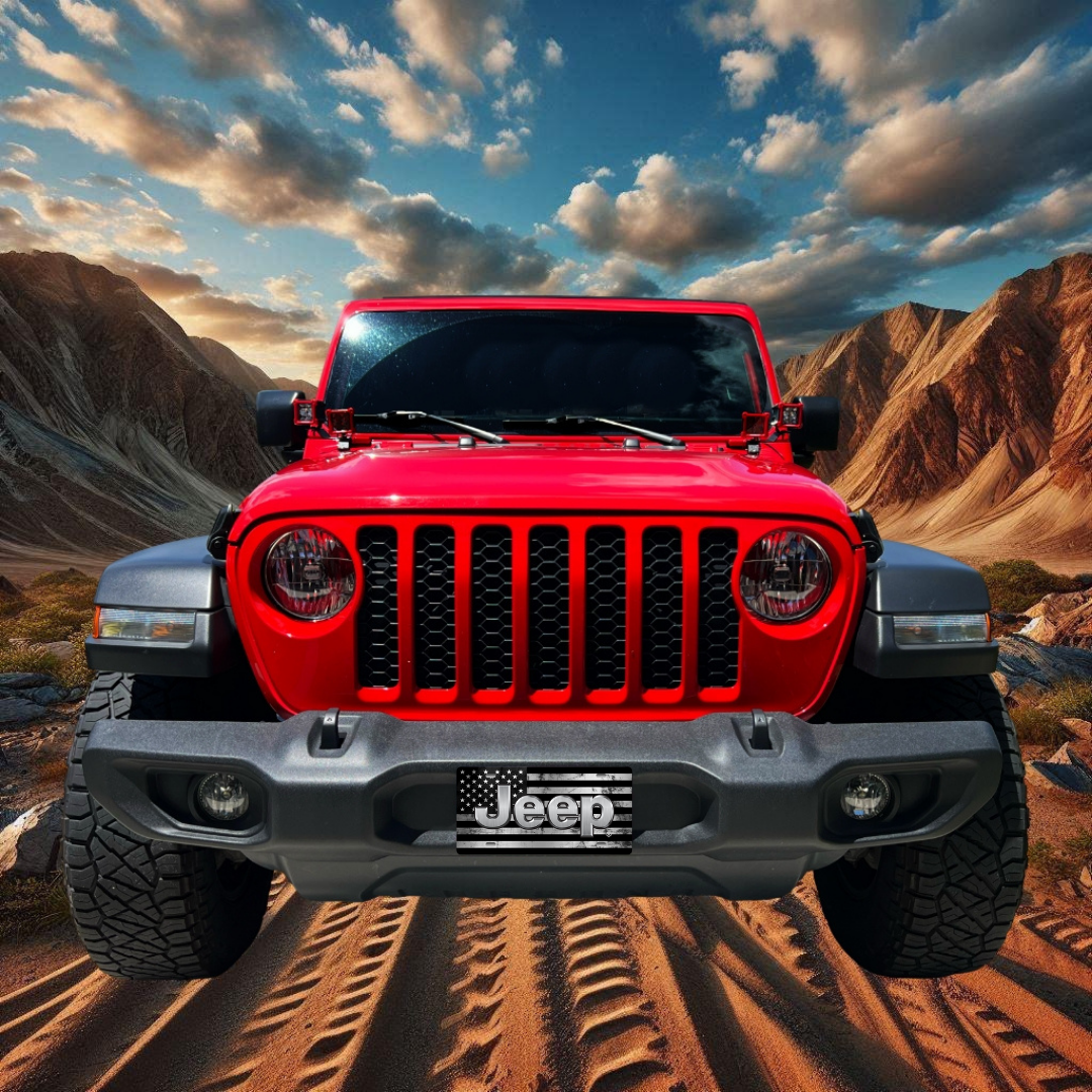 Jeep Distressed Flag – Stainless & Black front plate on a red Jeep Wrangler