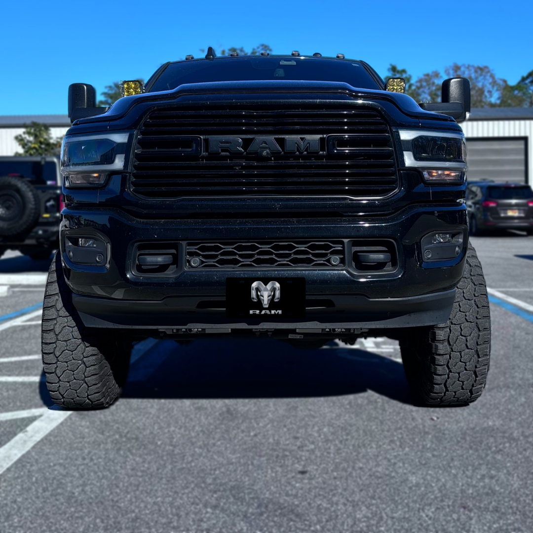 RAM – Black front plate on a black Ram truck