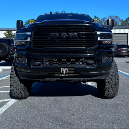 RAM – Grey & Black Flag front plate on a black Ram truck