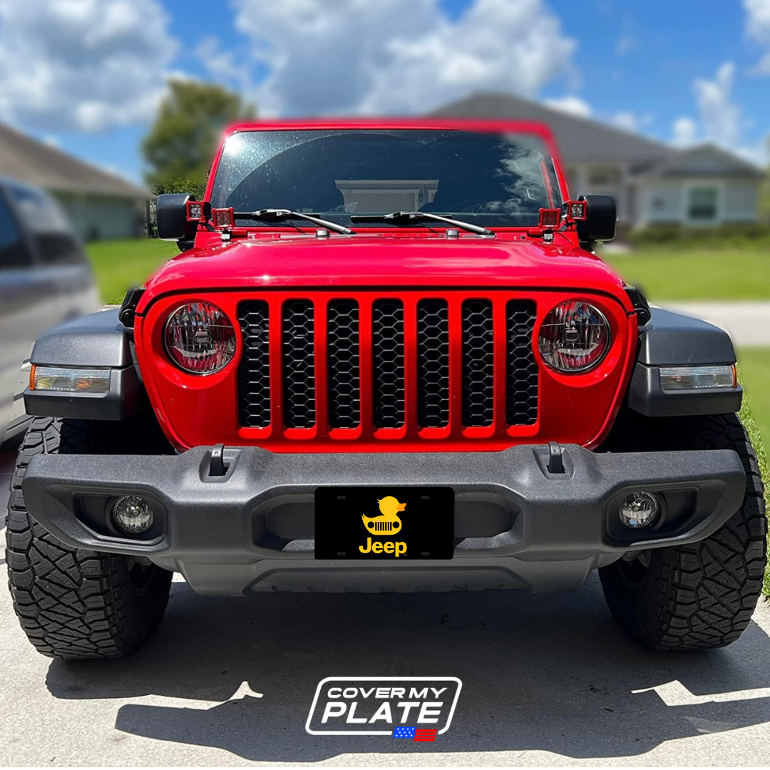 Red Jeep Wrangler with a Jeep Duck front plate