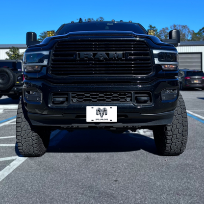 RAM – White front plate on a black Ram truck